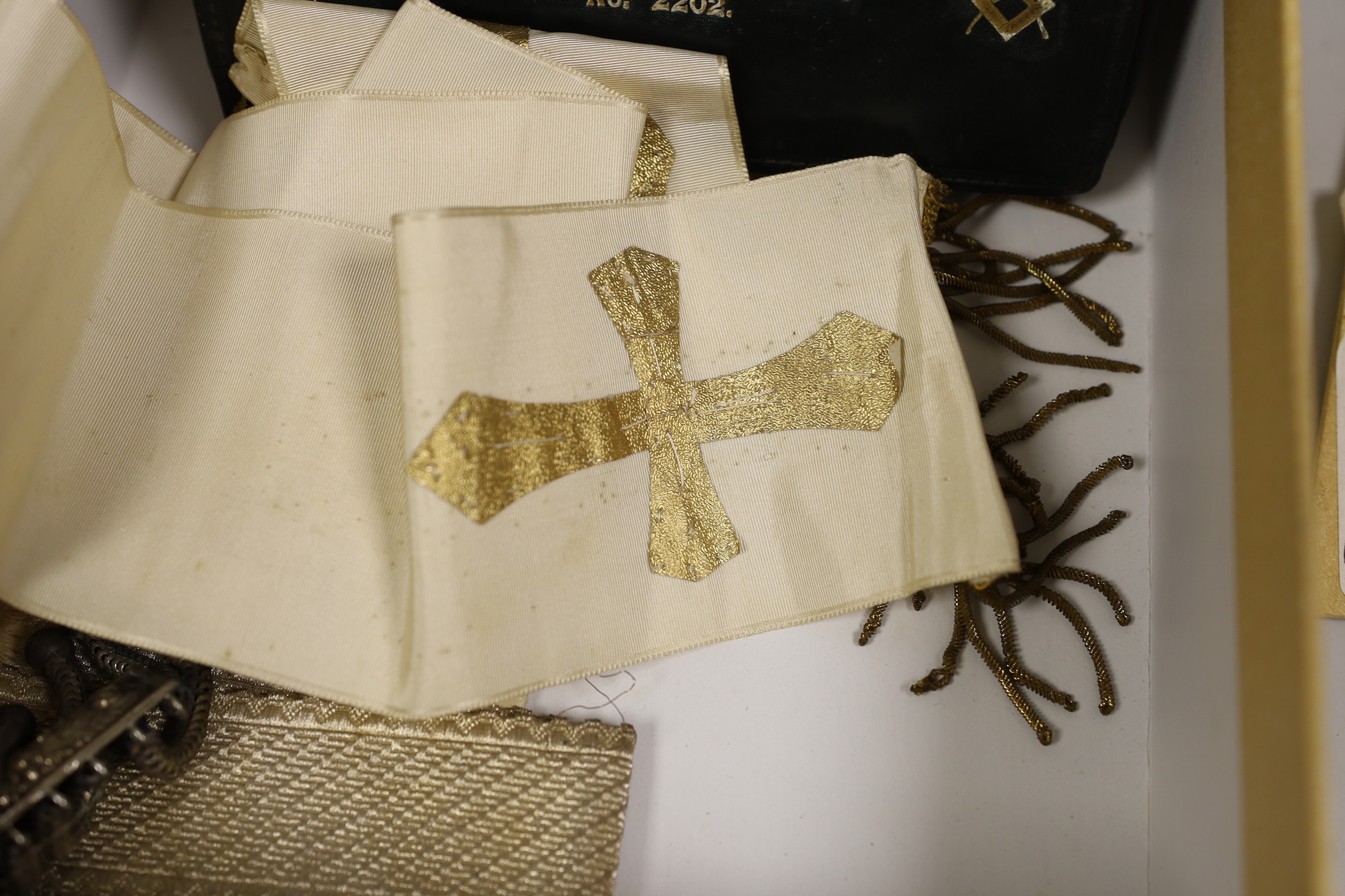 A Masonic silver jewel, various sashes, epaulette’s etc